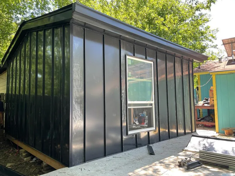 Black standing seam metal wall panels for Metal Roof Installation in West Warwick