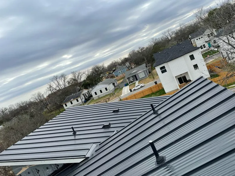 Standing seam metal roof panels with vents for Skylight Repair in West Warwick
